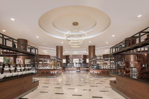 a store with a large room with many shelves at Xanadu Makadi Bay - High Class All Inclusive in Hurghada