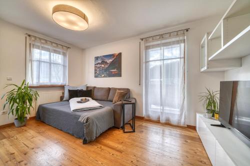 A bed or beds in a room at FaWa Apartments "Family"