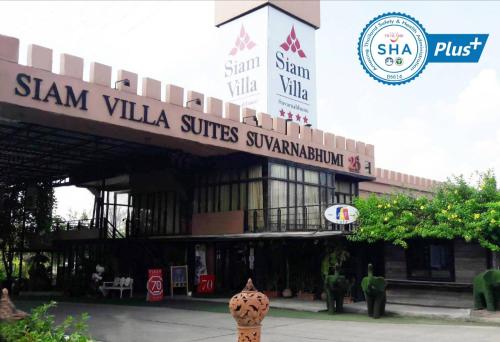 a building with a sign that reads sam villa suites synagoguation at Siam Villa Suvarnabhumi in Ban Khlong Si