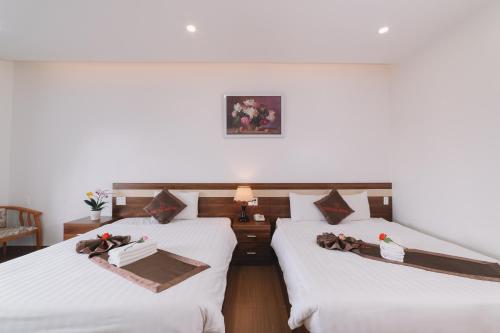 Anh Duc Hotel Da Latにあるベッド