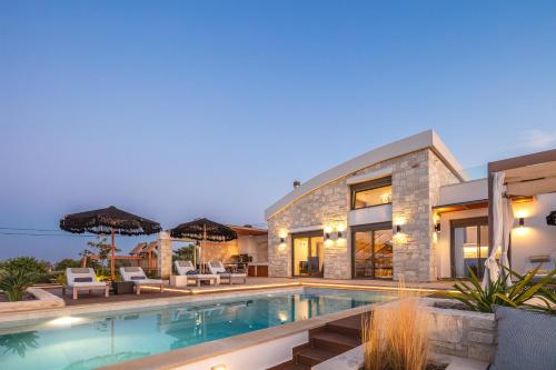 Bazén v ubytování Oneiric Exclusive Villas nebo v jeho okolí