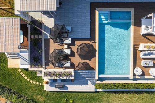 Bazén v ubytování Oneiric Exclusive Villas nebo v jeho okolí