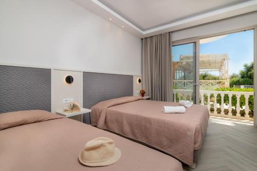 Postel nebo postele na pokoji v ubytování Maria Hotel