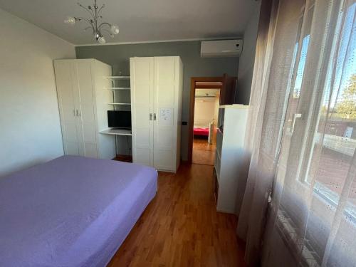 Ένα ή περισσότερα κρεβάτια σε δωμάτιο στο Casa da Miki e Ico
