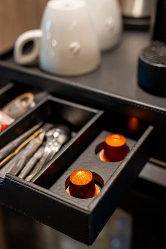 a drawer in a kitchen with some food in it at Parkhotel in Bad Waldsee