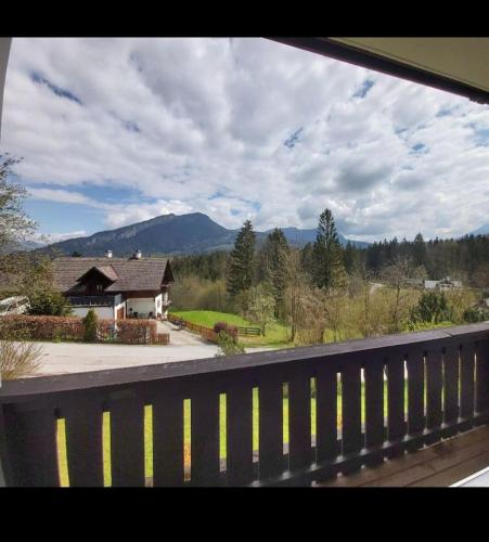 a view of a house from a balcony at Dachstein Blick in Bad Goisern