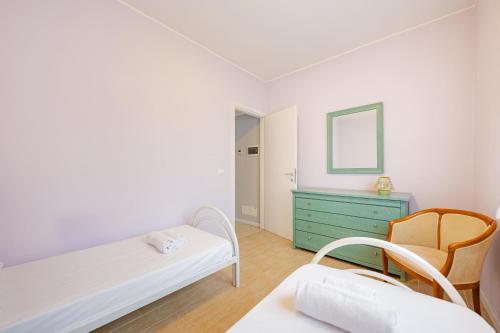 Un pat sau paturi într-o cameră la Venice Secret Room - 20 min da Venezia