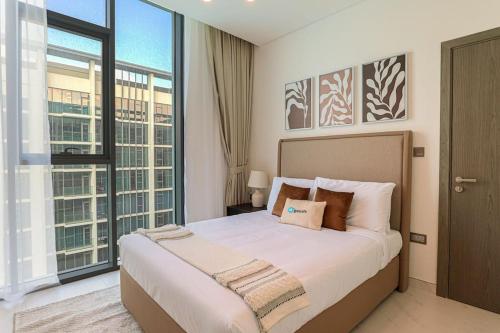 Fotografie z fotogalerie ubytování HiGuests - Magnificent Apartment with Stunning Lagoon Views v Dubaji