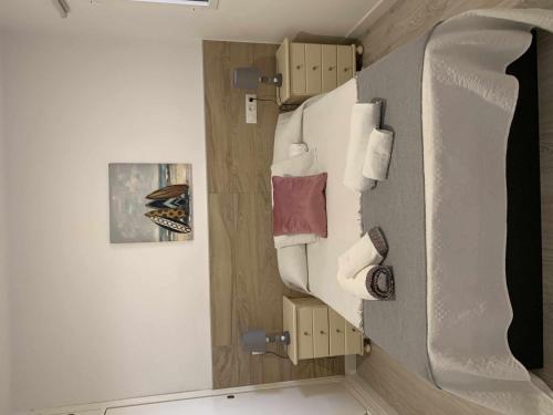 En eller flere senge i et værelse på Apartamento 8 mamia costa