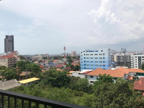 a view of a city from a balcony at Diamond Suite in Pattaya South