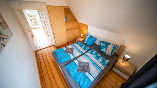 Katil atau katil-katil dalam bilik di Ferienhaus-Saale-Unstrut