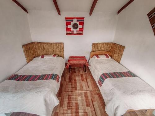 Katil atau katil-katil dalam bilik di INTI WASI LODGE