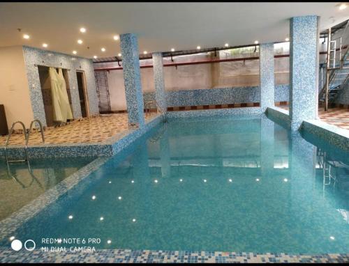 Swimming pool sa o malapit sa Goroomgo Hotel Aviani New Digha