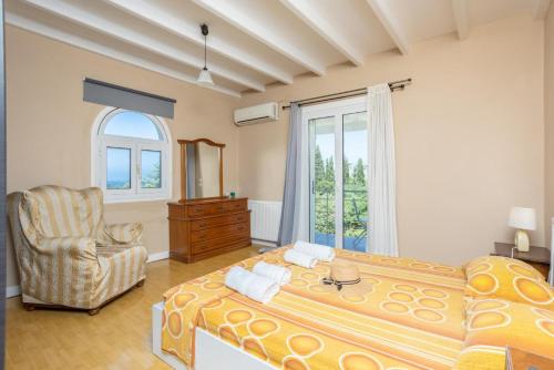 Кровать или кровати в номере Villa Mavrikia