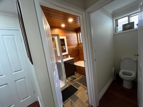 a small bathroom with a toilet and a sink at 8 Heather in Belgrave South