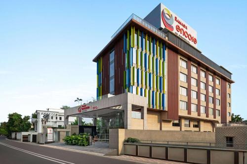 a rendering of the front of a hotel at Ramada Encore by Wyndham Bareilly Civil Lines in Bareilly