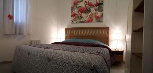 Кровать или кровати в номере Appartement front de mer avec vue et accès plage, Saintes-Maries-de-la-Mer