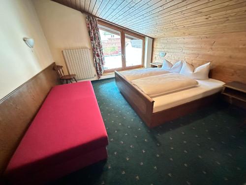 Appartementhaus Zillertal Arenaにあるベッド
