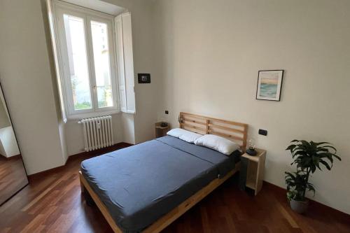 Postel nebo postele na pokoji v ubytování "Iris" Milano Lunigiana
