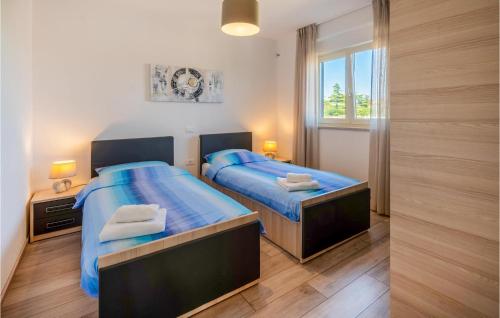 Postel nebo postele na pokoji v ubytování Amazing Home In Pula With Outdoor Swimming Pool