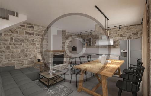 a kitchen and dining room with a table and chairs at Gorgeous Home In Sinj With Kitchen in Sinj