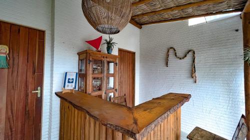 a room with a wooden counter on the wall at Isla Beach Hotel in Pecém