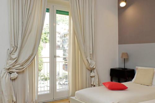 Krevet ili kreveti u jedinici u okviru objekta Confortevole appartamento vicino Ponte Milvio