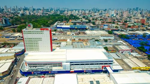 an aerial view of a city with buildings at Mega Moda Goiania Hotel in Goiânia