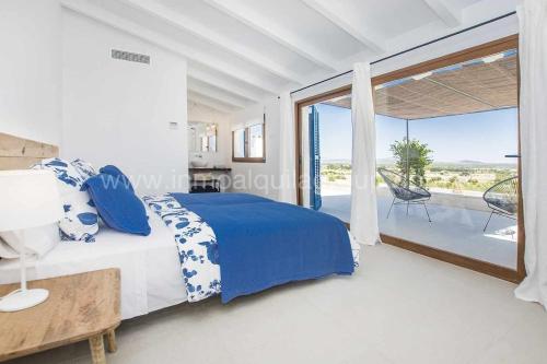 Ένα ή περισσότερα κρεβάτια σε δωμάτιο στο YourHouse Carrera Plana