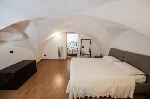 Postel nebo postele na pokoji v ubytování La Volta di Fulcignano