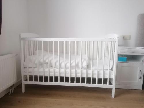 Ένα ή περισσότερα κρεβάτια σε δωμάτιο στο La Maison Heureuse
