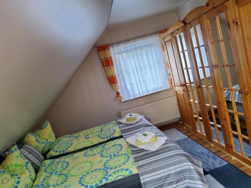 Postel nebo postele na pokoji v ubytování Ferienwohnung Anna