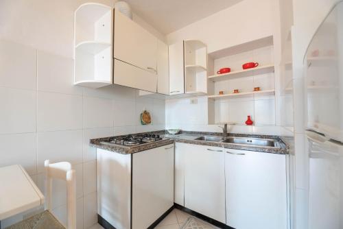Η κουζίνα ή μικρή κουζίνα στο Apartments La Turistica
