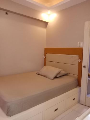 Ένα ή περισσότερα κρεβάτια σε δωμάτιο στο Re:Mark's Staycation