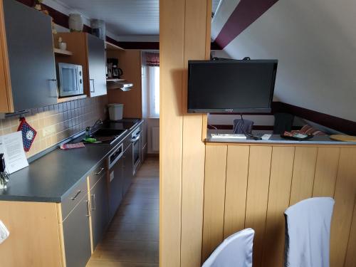 Kuchyň nebo kuchyňský kout v ubytování Ferienwohnung Anna