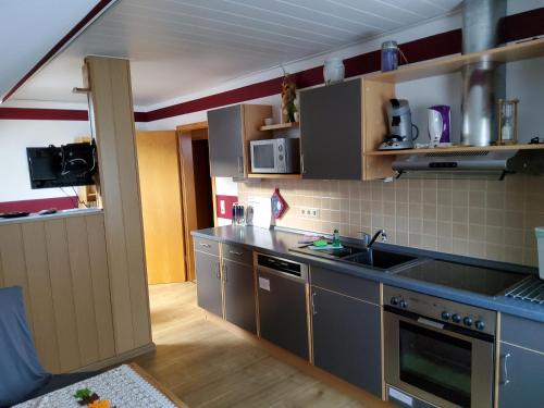 Kuchyň nebo kuchyňský kout v ubytování Ferienwohnung Anna