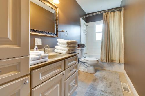 a bathroom with a sink and a toilet at Updated Robinson Vacation Rental with Fireplace! in Robinson