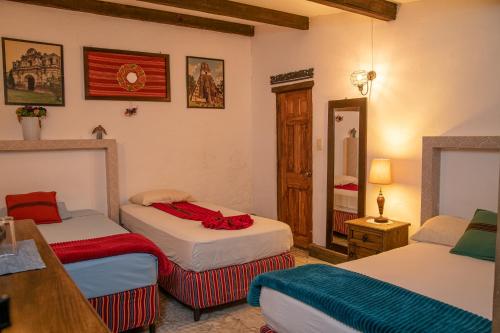 Postel nebo postele na pokoji v ubytování Nikikot Hostel & Hotel