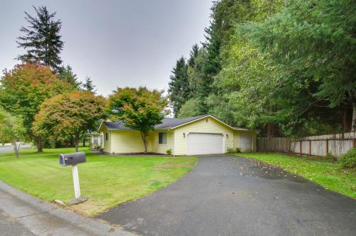 a house with a mailbox on the side of a driveway at Coastal Retreat Near Redwoods and 2 Miles to Beach! in Crescent City