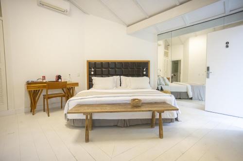 Ένα ή περισσότερα κρεβάτια σε δωμάτιο στο Felissimo Exclusive Hotel