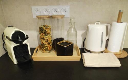 a counter with a blender and other items on it at CHEZ TAMARA in Nice