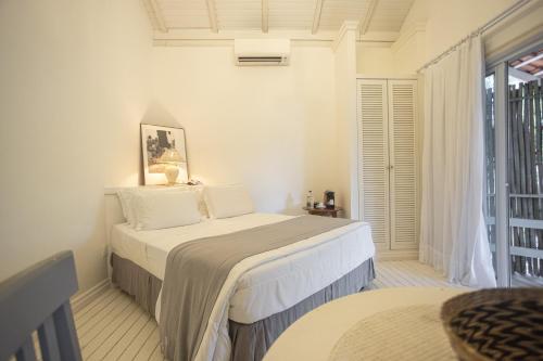Ένα ή περισσότερα κρεβάτια σε δωμάτιο στο Felissimo Exclusive Hotel