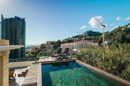 Изглед към басейн в Montecarlo Luxury Apartment Pool или наблизо