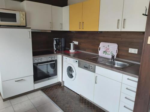 Kuchyň nebo kuchyňský kout v ubytování Studiohaus PIRATENWEG 145