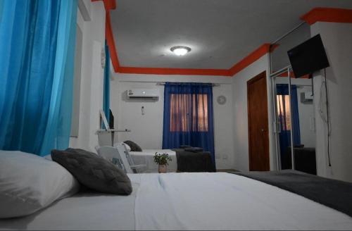 Postel nebo postele na pokoji v ubytování Hotel Dubaird