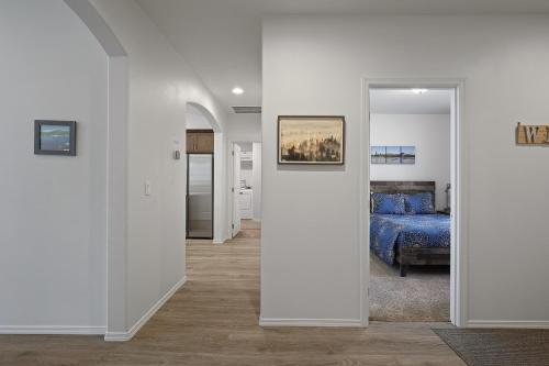 a room with a bed and a mirror at 172 Avocet home in Sunriver