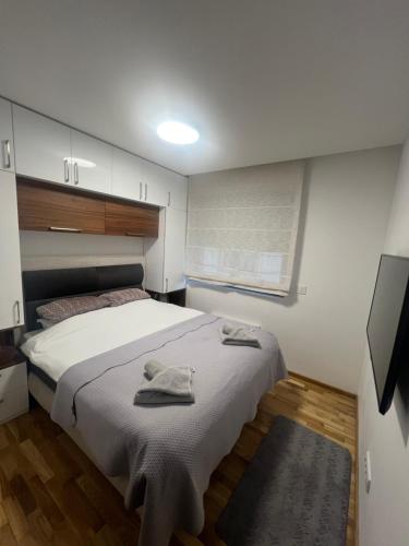 Postel nebo postele na pokoji v ubytování Golden Forest apartman 7