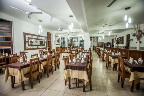 Restoran või mõni muu söögikoht majutusasutuses Hotel Cabaña Quinta