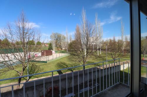 a view of a field from a balcony at Guest House Chaves in Chaves