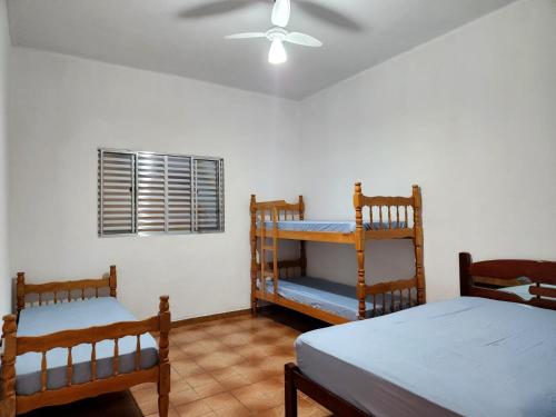 Postel nebo postele na pokoji v ubytování Casa no Centro 600m da Praia